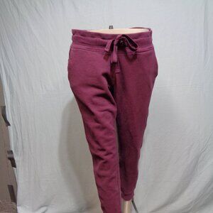 Women's Calvin Kline burgundy capri joggers in size medium.